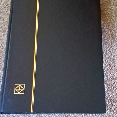 Black bound stamp stock book - black,